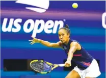  ?? AP PHOTO/SETH WENIG ?? Leylah Fernandez returns a shot to Aryna Sabalenka during their U.S. Open semifinal on Thursday night in New York.