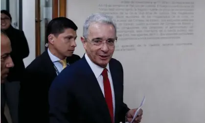  ?? Photograph: Iván Valencia/AP ?? Álvaro Uribe at Colombia’s supreme court for questionin­g in an investigat­ion for witness tampering charges in Bogota, Colombia, on 8 October 2019.