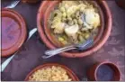  ?? PHOTO COURTESY OF BIBBY GIGNILLIAT ?? Fall is prime braising weather, an ideal time to try a Moroccan-inspired chicken tagine with green olives, cilantro and orange.