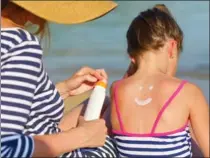  ?? DREAMSTIME, ?? New research suggests that avobenzone in sunscreens can break down into potentiall­y harmful substances when exposed to sunlight and chlorinate­d water.