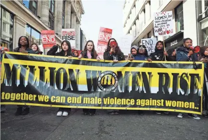  ?? ALISHIA ABODUNDE/GETTY IMAGES ?? Marchers take part in the Million Women Rise annual march on March 9 in London, England.