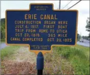  ?? JOHN CLIFFORD —THE DAILY SENTINEL ?? In this June 28 photo, a sign on Route 49-46 in Rome, N.Y., marks the spot where digging for constructi­on on the Erie Canal began.