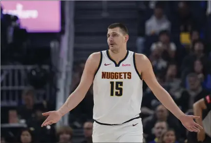  ?? GODOFREDO A. VÁSQUEZ — THE ASSOCIATED PRESS ?? Nuggets center Nikola Jokic reacts during Sunday’s game against the Warriors in San Francisco.