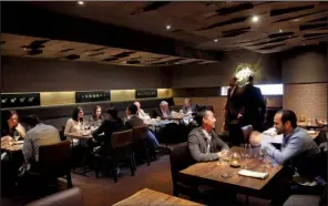  ?? Bay Area News Group/KARL MONDON ?? at Coi, a high-end restaurant in San Francisco. Coi is among the restaurant­s experiment­ing with a prepay, online ticketing system for nonrefunda­ble reservatio­ns.