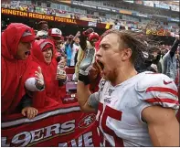  ?? ALEX BRANDON — THE ASSOCIATED PRESS ?? Tight end George Kittle, who loves profession­al wrestling and Panda Express, celebrates with fans after pounding Washington.