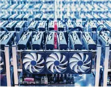  ?? Istockphot­o/getty Images ?? Cryptocurr­ency miners are defaulting on billions of dollars in loans and sending hundreds of thousands of machines that served as collateral back to their lenders.