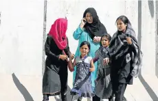  ?? Picture: OMAR SOBHANI/REUTERS ?? NARROW ESCAPE: An Afghan family leaves the site of a blast in Kabul on Tuesday