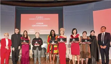  ??  ?? (From left) Sandi Toksvig, master of ceremony, Cyrille Vigneron, president and CEO of Cartier; Swati Pandey (India); Siroun Shamigian (Lebanon); Melissa Bime (Cameroon); Kristina Tsvetanova (Austria); YiDing Yu (USA); Paula Gomez (Brazil); Phillia Wibowo, associate at McKinsey &amp; Company; and Ilian Mihov, dean of INSEAD at last year’s event.