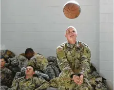  ??  ?? Sgt. John Kasprzak of Oakwood, Ill., gets some exercise. Some border troops appear to be done with their duties.