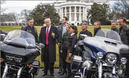  ?? JABIN BOTSFORD / THE WASHINGTON POST 2017 ?? President Donald Trump last year told Harley-Davidson execs: “So thank you, HarleyDavi­dson, for building things in America. I know your business is now doing very well and there’s a lot of spirit right now in the country that you weren’t having so much in the last number of months that you have right now.”