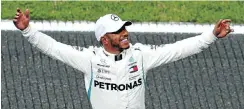  ?? Picture: Getty Images ?? Pole qualifier Lewis Hamilton of Mercedes celebrates.