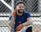  ?? Karen Warren / Staff photograph­er ?? The Astros are happy to see Jose Altuve’s normal playful self resurface after a grim 2020 season.