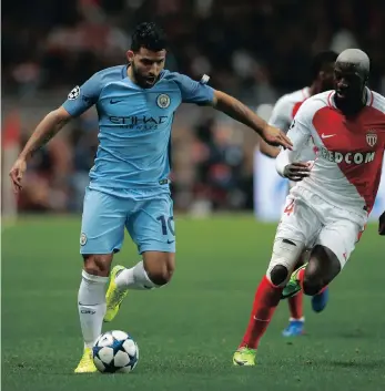  ??  ?? MERCURIAL: Manchester City’s Sergio Aguero in action with Monaco’s Tiemoue Bakayoko in a midweek Champions League clash.