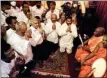  ?? PTI ?? Sri Lanka's new prime minister Ranil Wickremesi­nghe, third left, takes part in religious observance­s at a temple in Colombo, Sri Lanka