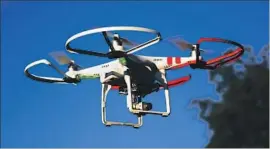  ?? Bruce Bennett Getty Images ?? THE APPROVAL allows exemptions from current drone safety regulation­s.