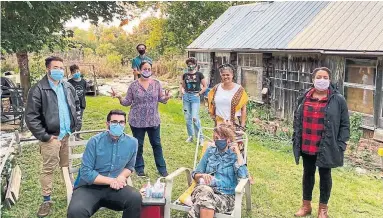  ?? THE CANADIAN PRESS ?? Members of Nadia Lloyd’s family attend an outdoor Thanksgivi­ng gathering last weekend in Belleville, Ont. Experts warn those choosing, and still allowed, to celebrate in person are still at risk and recommend against it.