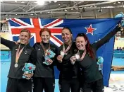  ?? GETTY IMAGES ?? New Zealand enjoyed a successful opening night at the Anna Meares Veledrome. Left, Ethan Mitchell, Eddie Dawkins and Sam Webster show off their gold medals; centre, Emma Cumming and Natasha Hansen celebrate their silver in the women’s team sprint; right, Bryony Botha, Rushlee Buchanan, Kirstie James and Racquel Sheath claimed silver in the team pursuit.