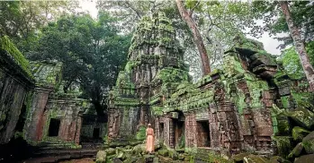  ??  ?? The Angkor Archaeolog­ical Park is just a few minutes’ tuk tuk ride from Cambodia’s Siem Reap.