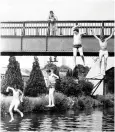  ??  ?? Boys jumping into the Feeder Canal in 1983. The recent debate over “wild swimming” in the City Docks is only the latest chapter in a long history of people having a dip in the local waterways