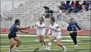  ?? ALISSA NOE — BOCOPREPS.COM ?? Mead’s Allie Hartman, second from right, fights for a path to the crease during Thursday’s game.