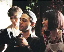  ?? SONS OF MANUAL ?? Filmmaker Xavier Dolan, centre, with Marion Cotillard, left, and Nathalie Baye on the set of It’s Only the End of the World.