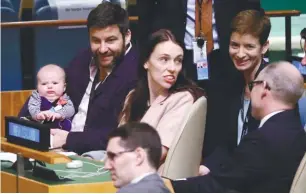  ??  ?? ... With a mock security pass that lists her as the ‘First Baby’ of New Zealand, three-month-old Neve Te Aroha made her United Nations debut on Monday when her mother – Prime Minister Jacinda Ardern – spoke at a peace summit in the UN General Assembly. Her partner Clarke Gayford, who is the baby’s full-time caregiver, sat with the New Zealand delegation and held Neve as Ardern spoke.