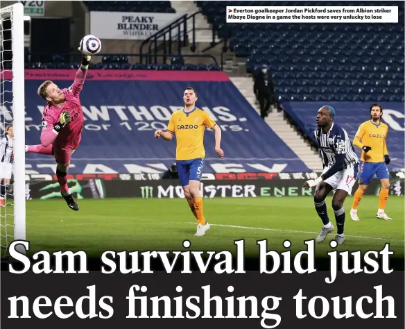  ??  ?? Everton goalkeeper Jordan Pickford saves from Albion striker Mbaye Diagne in a game the hosts were very unlucky to lose