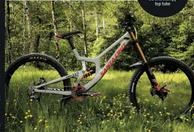  ??  ?? Greg Minnaar’s latest 29er V10 prototype is a far cry from the original bike, with its sky-high BB and stumpy top tube