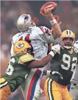  ?? PACKER PLUS FILES ?? LeRoy Butler played a big role in the Packers taking down quarterbac­k Drew Bledsoe and the Patriots in Super Bowl XXXI in New Orleans.