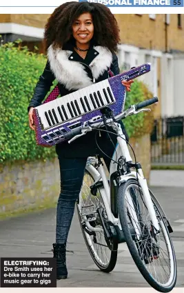  ??  ?? ELECTRIFYI­NG: Dre Smith uses her e-bike to carry her music gear to gigs