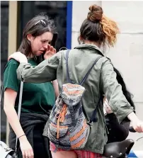  ?? Reuters ?? a group of girls react near london Bridge after the attack central in london. —