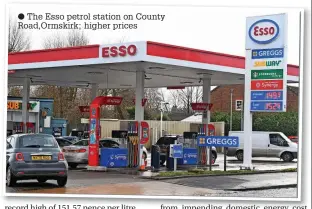  ?? ?? The Esso petrol station on County Road,Ormskirk; higher prices