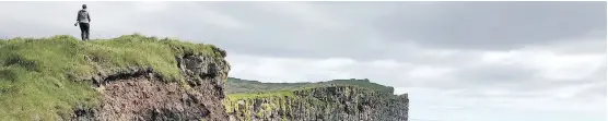  ??  ?? The Látrabjarg cliffs, Iceland’s westernmos­t point, offer vast coastline views and are home to millions of birds, including puffins, northern gannets, guillemots and razorbills.