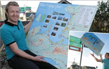  ?? Photos by Domnick Walsh ?? Brian Coakley with his new map putting the glorious sweep of Tralee Bay, with its beaches, mountains and varied attraction­s at the heart of the Kingdom’s tourism industry.