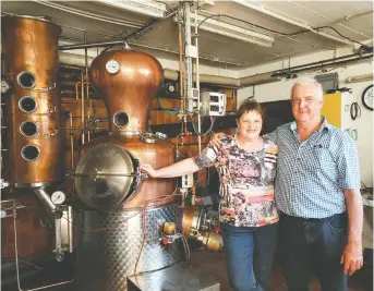  ??  ?? Anneliese and Fridolin Baumgartne­r make a variety of schnapps from local fruit at their distillery in Kaiserstuh­l.