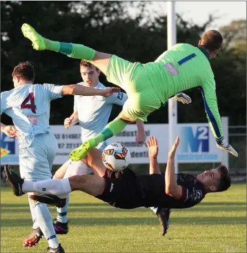  ??  ?? The controvers­ial incident when Aaron Dobbs was denied a clear goal chance by netminder Paul Hunt.