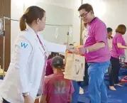  ??  ?? Danilo Chiong, Watsons chief operating officer, in one of Watsons medical missions