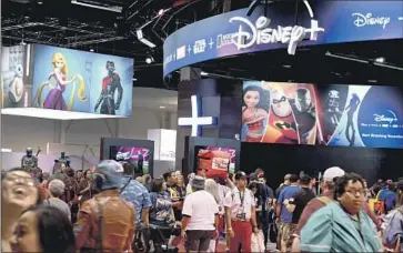  ?? Robyn Beck AFP/Getty Images ?? THE D23 EXPO, a presentati­on for fans, touts Disney+ programmin­g as well as film and theme park projects.