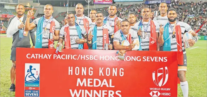  ?? Picture: WORLD RUGBY ?? The Fiji 7s team members with their silver medals at the So Kon Po Stadium.