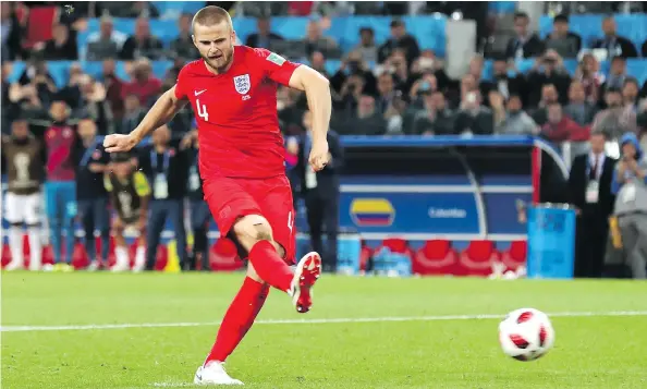  ?? CLIVE ROSE / GETTY IMAGES ?? Eric Dier of England scores his team’s fifth penalty in the penalty shootout Tuesday to win the Round of 16 match against Colombia at the FIFA World Cup in Moscow.