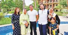  ?? ?? Hassan Latif Talib, third from left, is spending the long Eid weekend at a luxury resort in Dubai, with his family members.