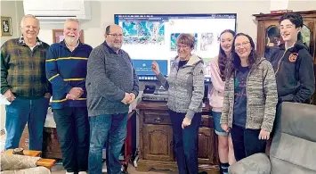  ?? ?? Launching the Baw Baw Biodiversi­ty website, bringing a much-loved poster of local fauna and flora to life, are (from left) Peter Ware, Chris Healy, Chris Rowney, Judy Farmer, Libby Haynes, Diane Haynes and Bobby Haynes.