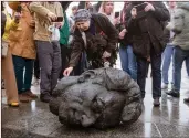  ?? ?? A Soviet-era monument is toppled in Kyiv