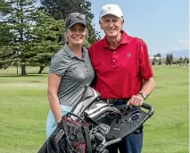  ?? STACY SQUIRES/STUFF ?? Sir Bob Charles and caddie Jess Reid ahead of the Russley Garden City Legends tournament in Christchur­ch yesterday.