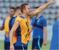  ?? (AFP) ?? England’s forward Harry Kane takes part in a training session at the Al Wakrah Stadium on the eve of the Qatar 2022 World Cup Group B match against Iran.