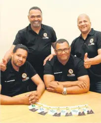  ?? Photo: Michelle Pienaar ?? APMo party representa­tives: (front from left) Dennis Scheepers (chairperso­n), Sebastian Petersen (president), (back) Mark Mesimela (religious desk), and Hyram Doolings (national organiser).