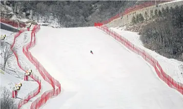  ??  ?? A skier skis at the National Alpine Ski Centre, a venue for the Beijing 2022 Olympic Winter Games, during a media tour of the 2022 Winter Olympic Games venues in the Yanqing district of Beijing on Feb 5.