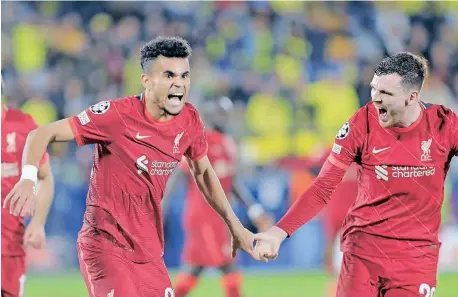  ?? | DOMENECH CASTELLO EPA ?? LUIS Diaz, left, celebrates with teammate Andy Robertson after scoring for Liverpool against Villarreal.
