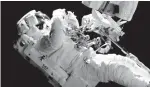  ?? NASA via AP ?? In this image from video made available by NASA, astronaut Joe Acaba performs a spacewalk Friday outside the Internatio­nal Space Station.