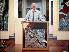  ?? LAWRENCE SMITH/FAIRFAX NZ ?? Art collector Sir James Wallace in his home, with a Ralph Hotere painting.
